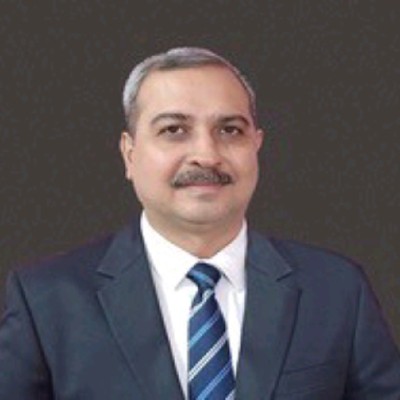 Dr Arun Sacher
